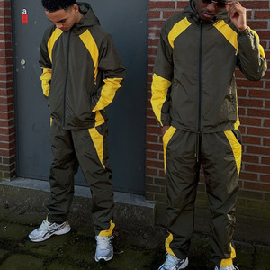 OEM Custom Patchwork Men Tracksuit 100% Polyester Windbreaker Pants And Jacket Set Sportswear Suit Jogger Set